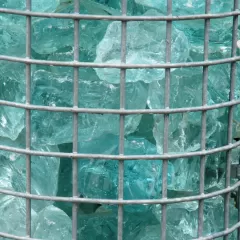 Qué función cumple el bloque de cristal en la estructura del edificio